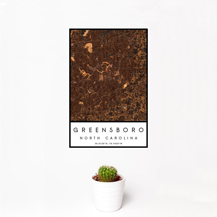 12x18 Greensboro North Carolina Map Print Portrait Orientation in Ember Style With Small Cactus Plant in White Planter