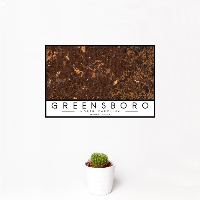 12x18 Greensboro North Carolina Map Print Landscape Orientation in Ember Style With Small Cactus Plant in White Planter