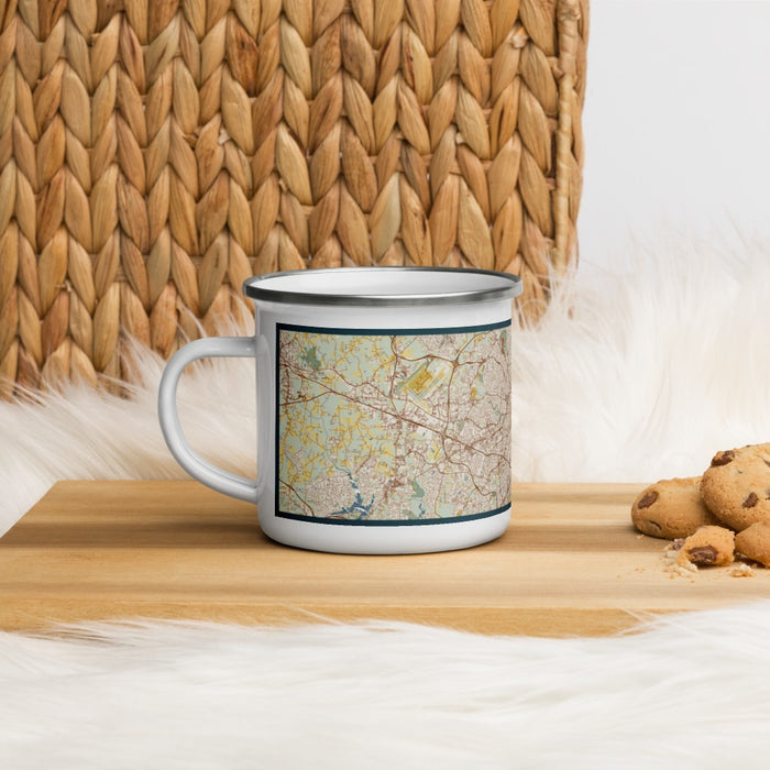 Left View Custom Greensboro North Carolina Map Enamel Mug in Woodblock on Table Top