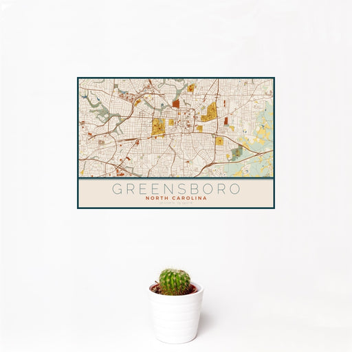 12x18 Greensboro North Carolina Map Print Landscape Orientation in Woodblock Style With Small Cactus Plant in White Planter