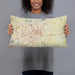 Person holding 20x12 Custom Greensboro North Carolina Map Throw Pillow in Woodblock