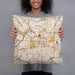 Person holding 18x18 Custom Greensboro North Carolina Map Throw Pillow in Woodblock