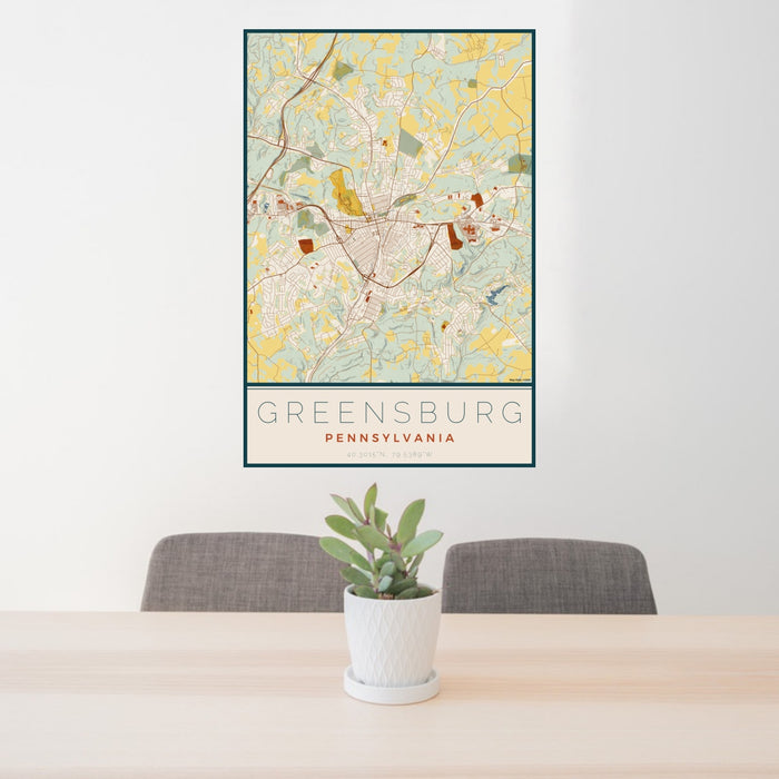24x36 Greensburg Pennsylvania Map Print Portrait Orientation in Woodblock Style Behind 2 Chairs Table and Potted Plant