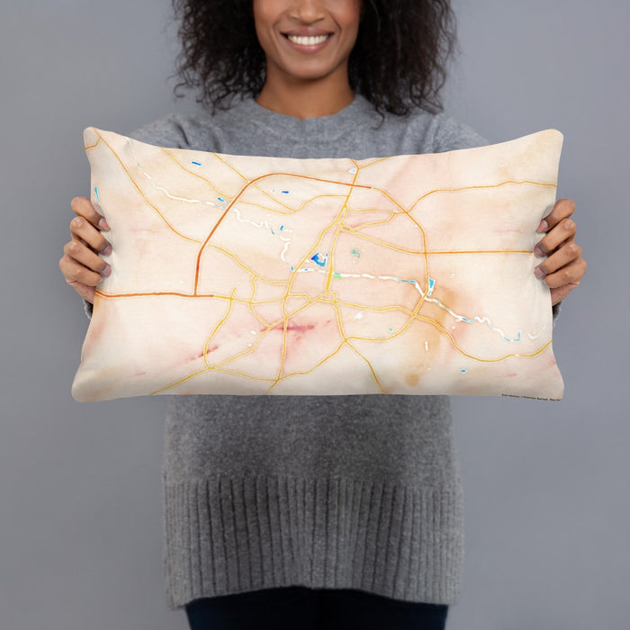 Person holding 20x12 Custom Greenville North Carolina Map Throw Pillow in Watercolor