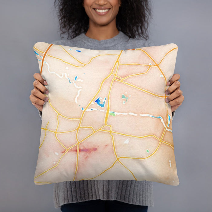 Person holding 18x18 Custom Greenville North Carolina Map Throw Pillow in Watercolor