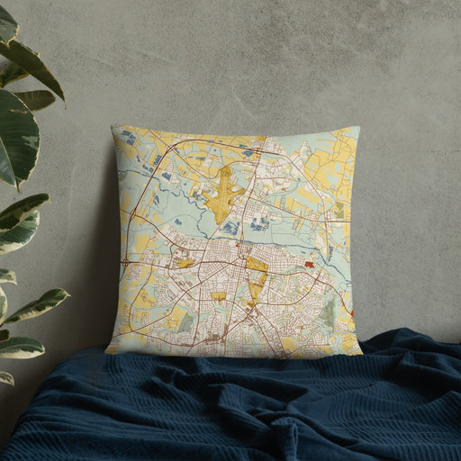 Custom Greenville North Carolina Map Throw Pillow in Woodblock on Bedding Against Wall