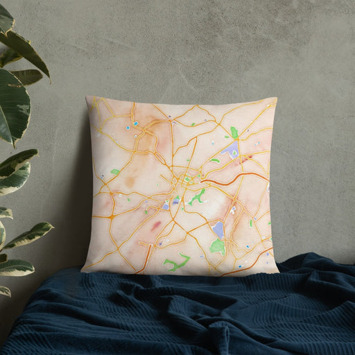 Custom Greenville South Carolina Map Throw Pillow in Watercolor on Bedding Against Wall