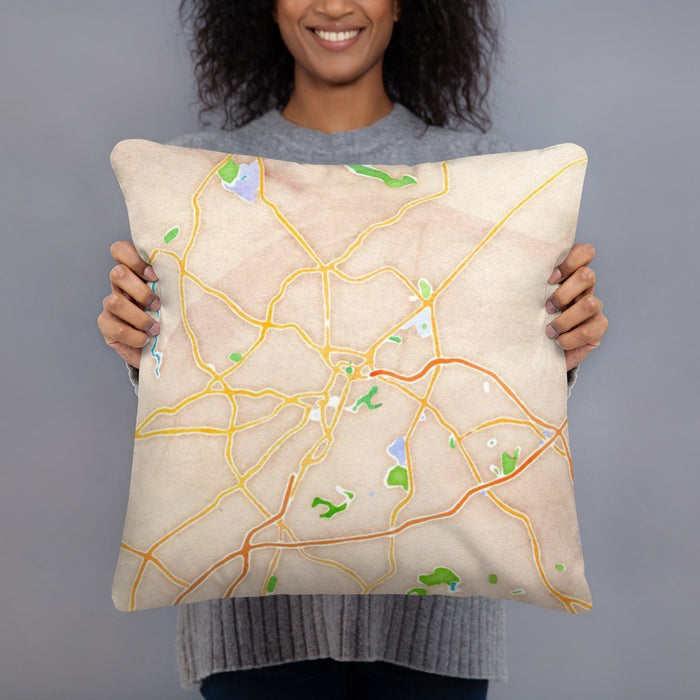 Person holding 18x18 Custom Greenville South Carolina Map Throw Pillow in Watercolor