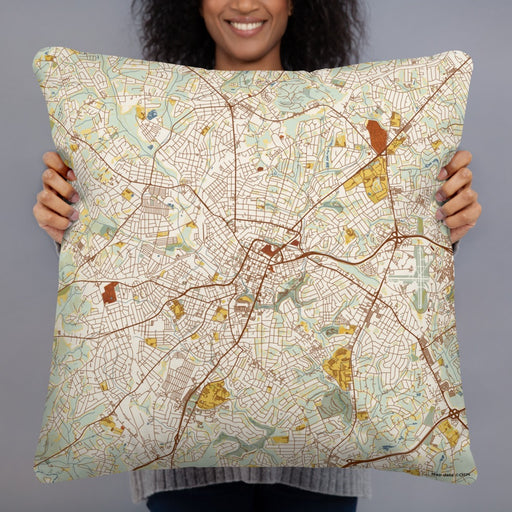Person holding 22x22 Custom Greenville South Carolina Map Throw Pillow in Woodblock