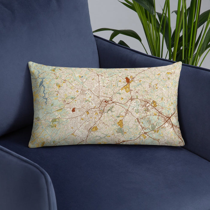 Custom Greenville South Carolina Map Throw Pillow in Woodblock on Blue Colored Chair