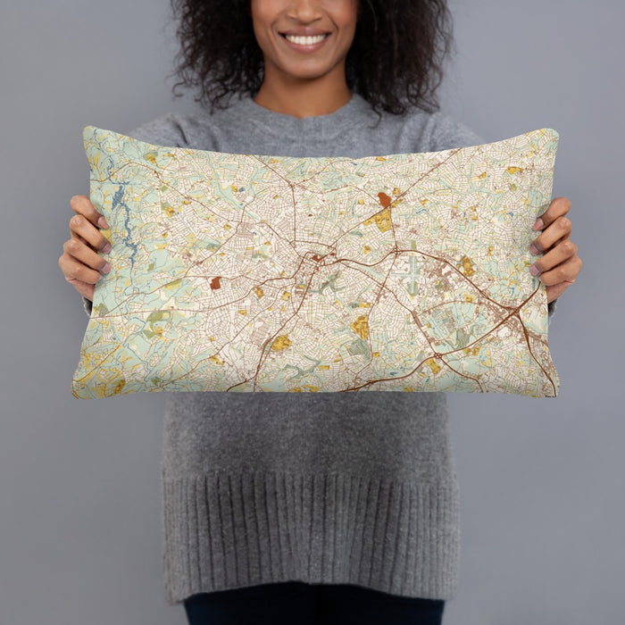 Person holding 20x12 Custom Greenville South Carolina Map Throw Pillow in Woodblock