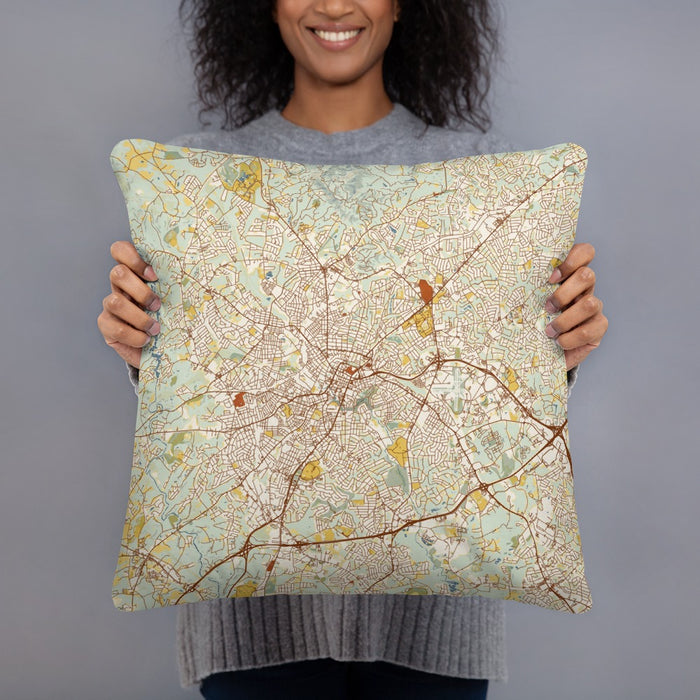 Person holding 18x18 Custom Greenville South Carolina Map Throw Pillow in Woodblock