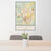 24x36 Gruene Texas Map Print Portrait Orientation in Woodblock Style Behind 2 Chairs Table and Potted Plant