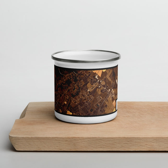 Front View Custom Gruene Texas Map Enamel Mug in Ember on Cutting Board