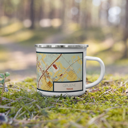 Right View Custom Gruene Texas Map Enamel Mug in Woodblock on Grass With Trees in Background