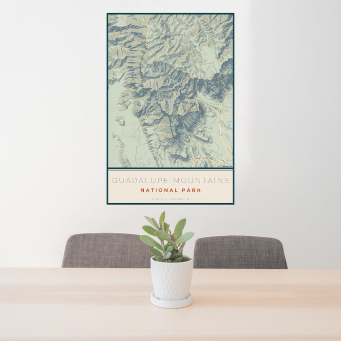 24x36 Guadalupe Mountains National Park Map Print Portrait Orientation in Woodblock Style Behind 2 Chairs Table and Potted Plant