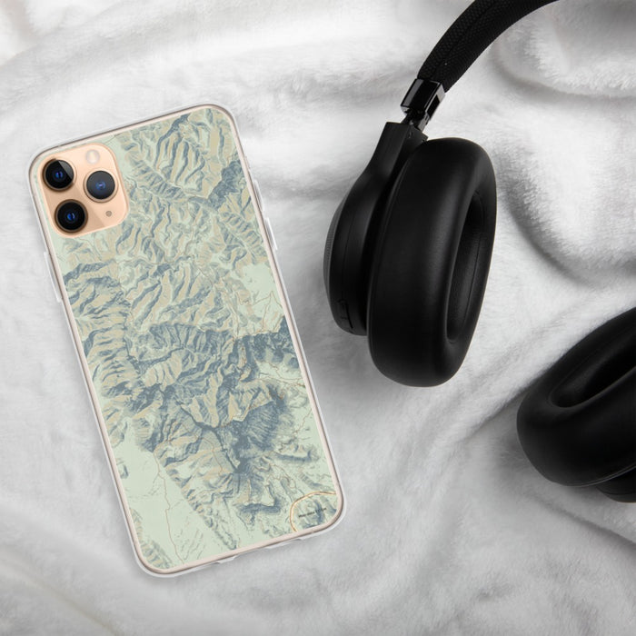 Custom Guadalupe Mountains National Park Map Phone Case in Woodblock on Table with Black Headphones