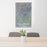 24x36 Guadalupe Peak Texas Map Print Portrait Orientation in Afternoon Style Behind 2 Chairs Table and Potted Plant