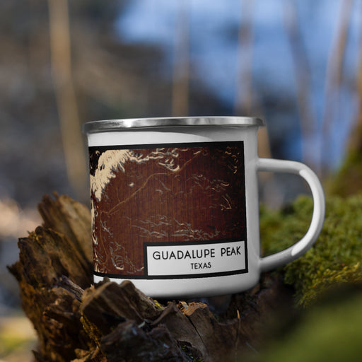 Right View Custom Guadalupe Peak Texas Map Enamel Mug in Ember on Grass With Trees in Background