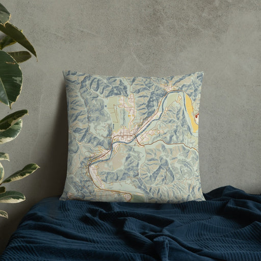 Custom Guerneville California Map Throw Pillow in Woodblock on Bedding Against Wall