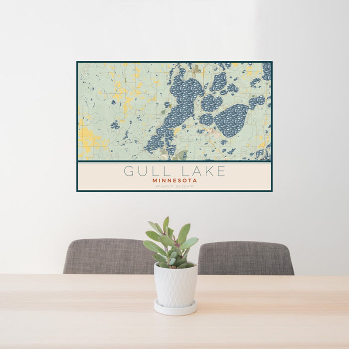 24x36 Gull Lake Minnesota Map Print Lanscape Orientation in Woodblock Style Behind 2 Chairs Table and Potted Plant
