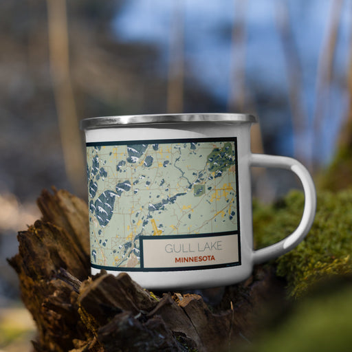 Right View Custom Gull Lake Minnesota Map Enamel Mug in Woodblock on Grass With Trees in Background