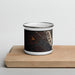 Front View Custom Gustavus Alaska Map Enamel Mug in Ember on Cutting Board