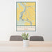 24x36 Hagerman Idaho Map Print Portrait Orientation in Woodblock Style Behind 2 Chairs Table and Potted Plant