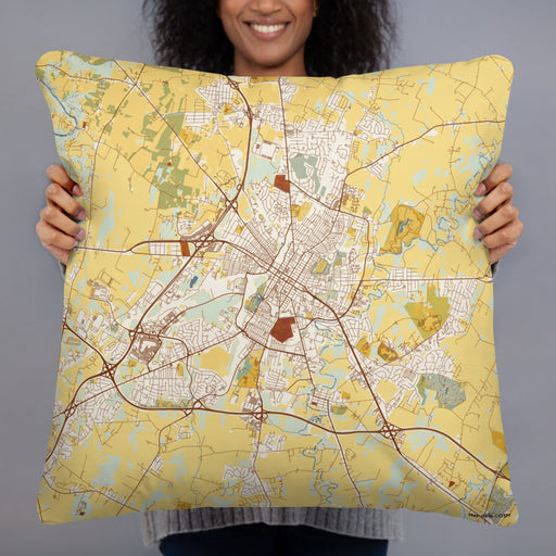 Person holding 22x22 Custom Hagerstown Maryland Map Throw Pillow in Woodblock