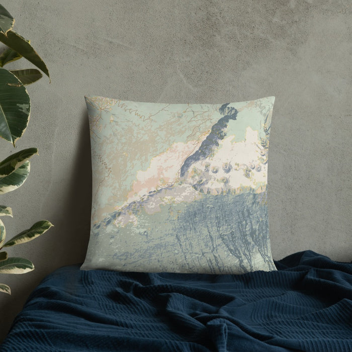 Custom Haleakala Hawaii Map Throw Pillow in Woodblock on Bedding Against Wall