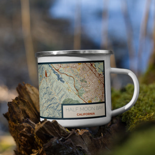 Right View Custom Half Moon Bay California Map Enamel Mug in Woodblock on Grass With Trees in Background
