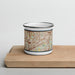 Front View Custom Haltom City Texas Map Enamel Mug in Woodblock on Cutting Board