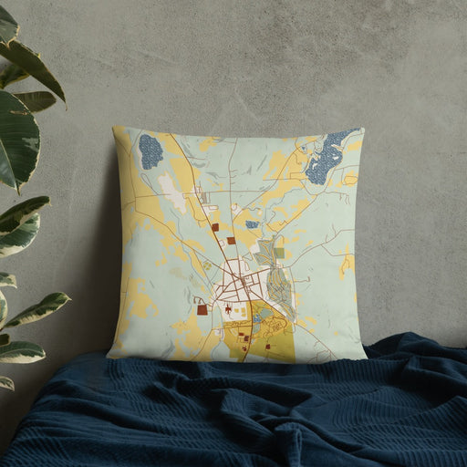 Custom Hamilton New York Map Throw Pillow in Woodblock on Bedding Against Wall