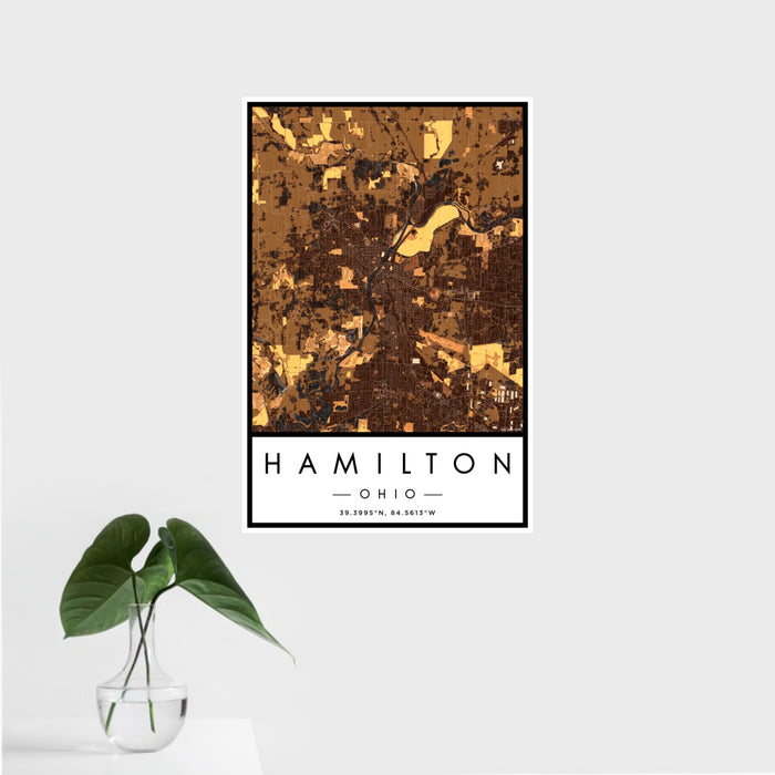 16x24 Hamilton Ohio Map Print Portrait Orientation in Ember Style With Tropical Plant Leaves in Water