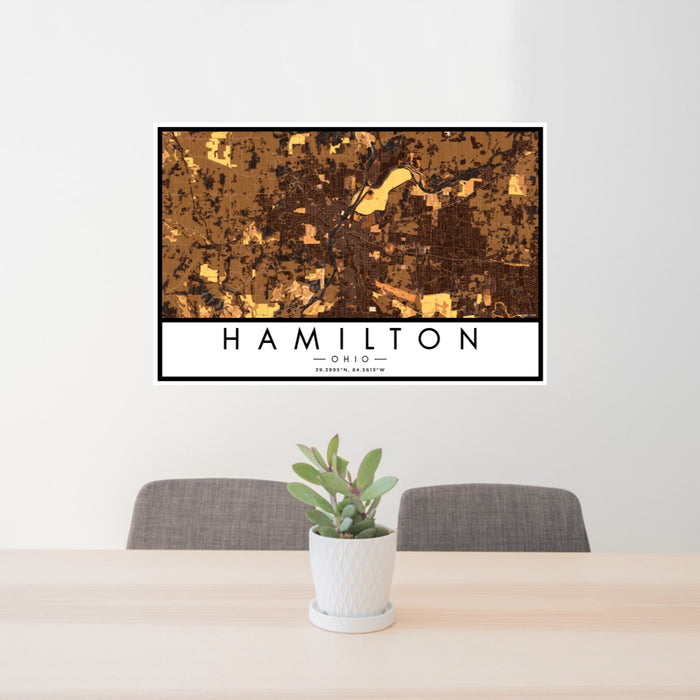 24x36 Hamilton Ohio Map Print Landscape Orientation in Ember Style Behind 2 Chairs Table and Potted Plant