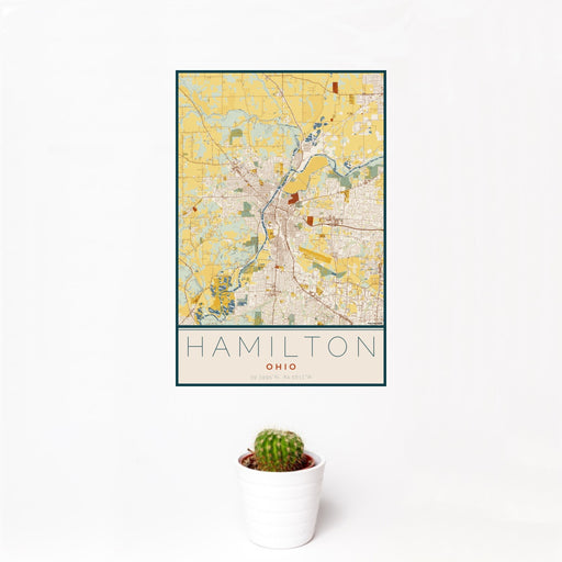 12x18 Hamilton Ohio Map Print Portrait Orientation in Woodblock Style With Small Cactus Plant in White Planter