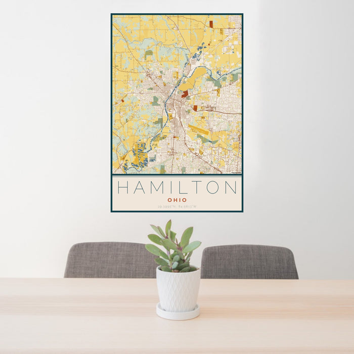 24x36 Hamilton Ohio Map Print Portrait Orientation in Woodblock Style Behind 2 Chairs Table and Potted Plant