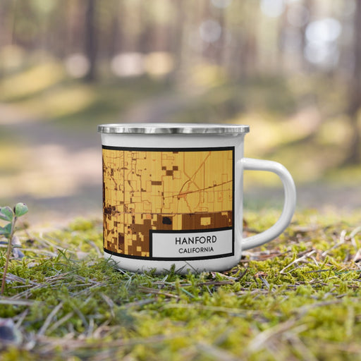 Right View Custom Hanford California Map Enamel Mug in Ember on Grass With Trees in Background