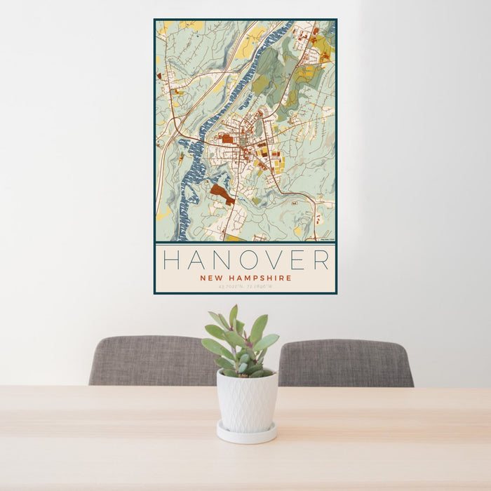 24x36 Hanover New Hampshire Map Print Portrait Orientation in Woodblock Style Behind 2 Chairs Table and Potted Plant