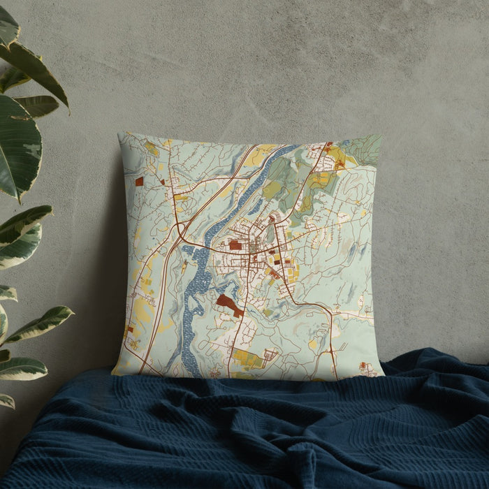 Custom Hanover New Hampshire Map Throw Pillow in Woodblock on Bedding Against Wall