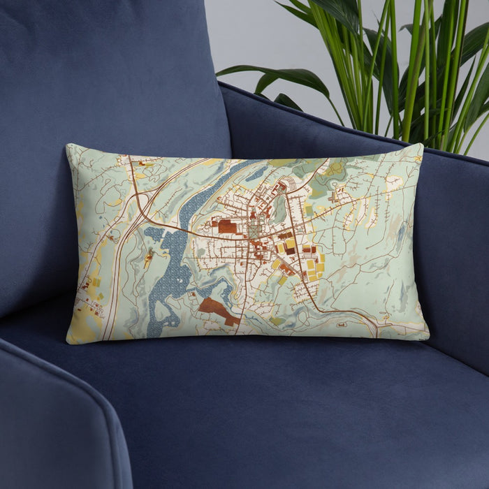 Custom Hanover New Hampshire Map Throw Pillow in Woodblock on Blue Colored Chair