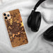 Custom Harlingen Texas Map Phone Case in Ember on Table with Black Headphones