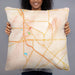 Person holding 22x22 Custom Harlingen Texas Map Throw Pillow in Watercolor