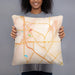 Person holding 18x18 Custom Harlingen Texas Map Throw Pillow in Watercolor