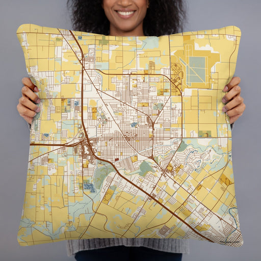 Person holding 22x22 Custom Harlingen Texas Map Throw Pillow in Woodblock
