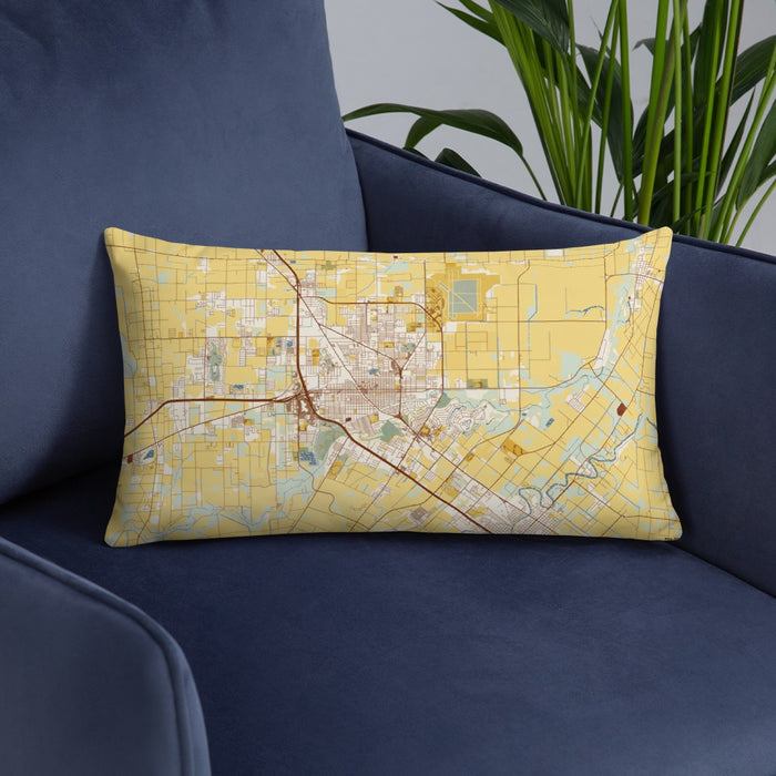 Custom Harlingen Texas Map Throw Pillow in Woodblock on Blue Colored Chair