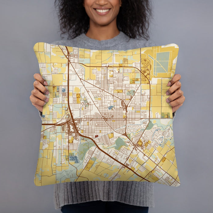 Person holding 18x18 Custom Harlingen Texas Map Throw Pillow in Woodblock