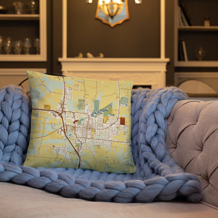 Custom Harrisonville Missouri Map Throw Pillow in Woodblock on Cream Colored Couch