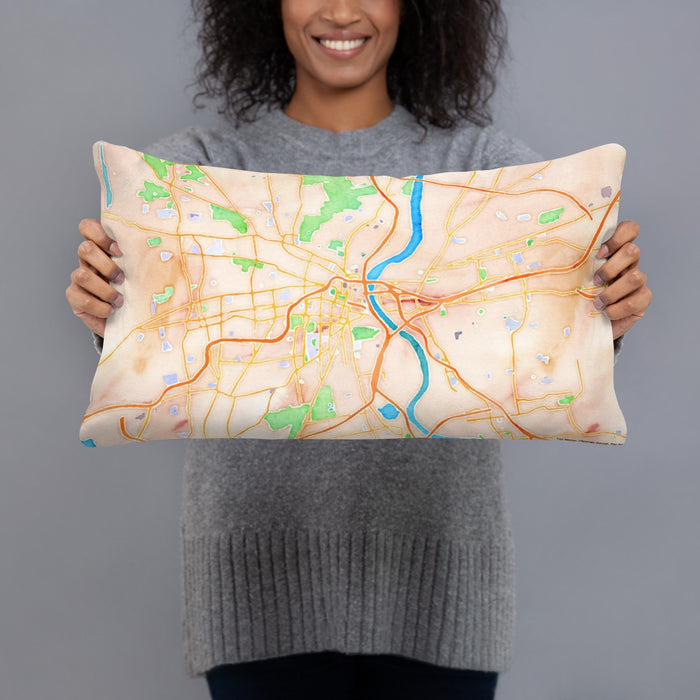 Person holding 20x12 Custom Hartford Connecticut Map Throw Pillow in Watercolor