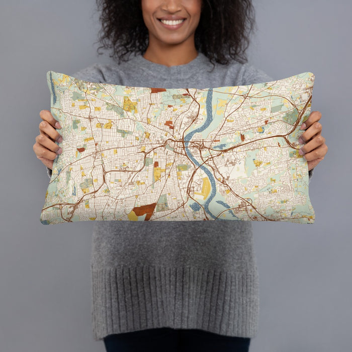 Person holding 20x12 Custom Hartford Connecticut Map Throw Pillow in Woodblock
